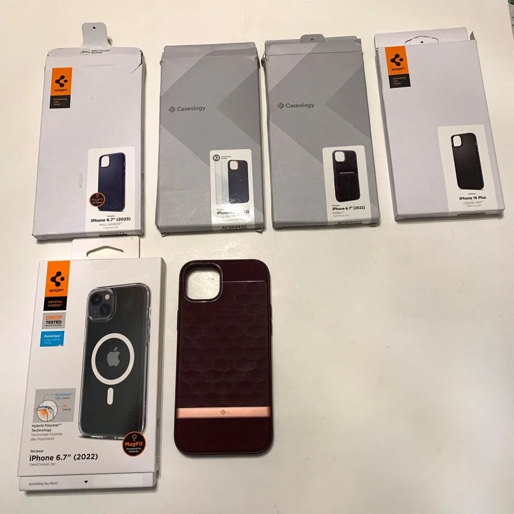 9 Assorted Spigen & Caseology iPhone 14 Plus and iPhone 15 Plus